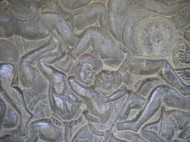 One detail of the devil fighting the monkey